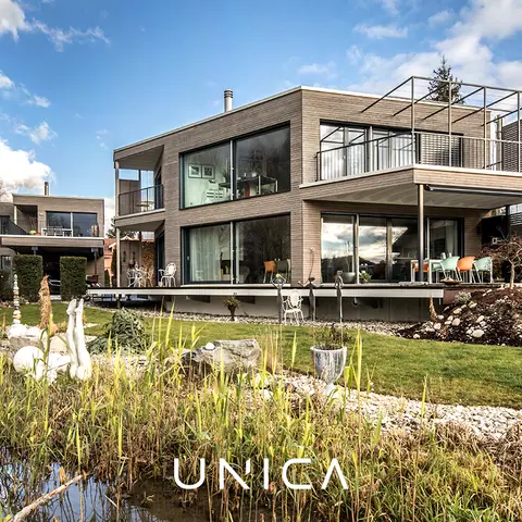 Eindrucksvolles Architektenhaus mit Teichanlage – Projekt von Unica Architektur AG